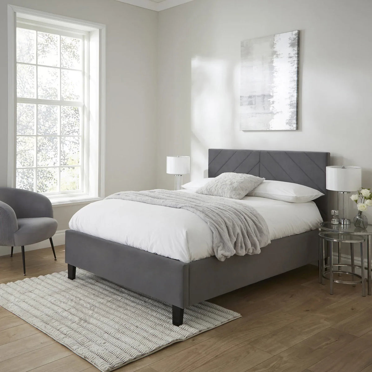Hoxton ottoman bed frame in grey velvet with a chevron headboard