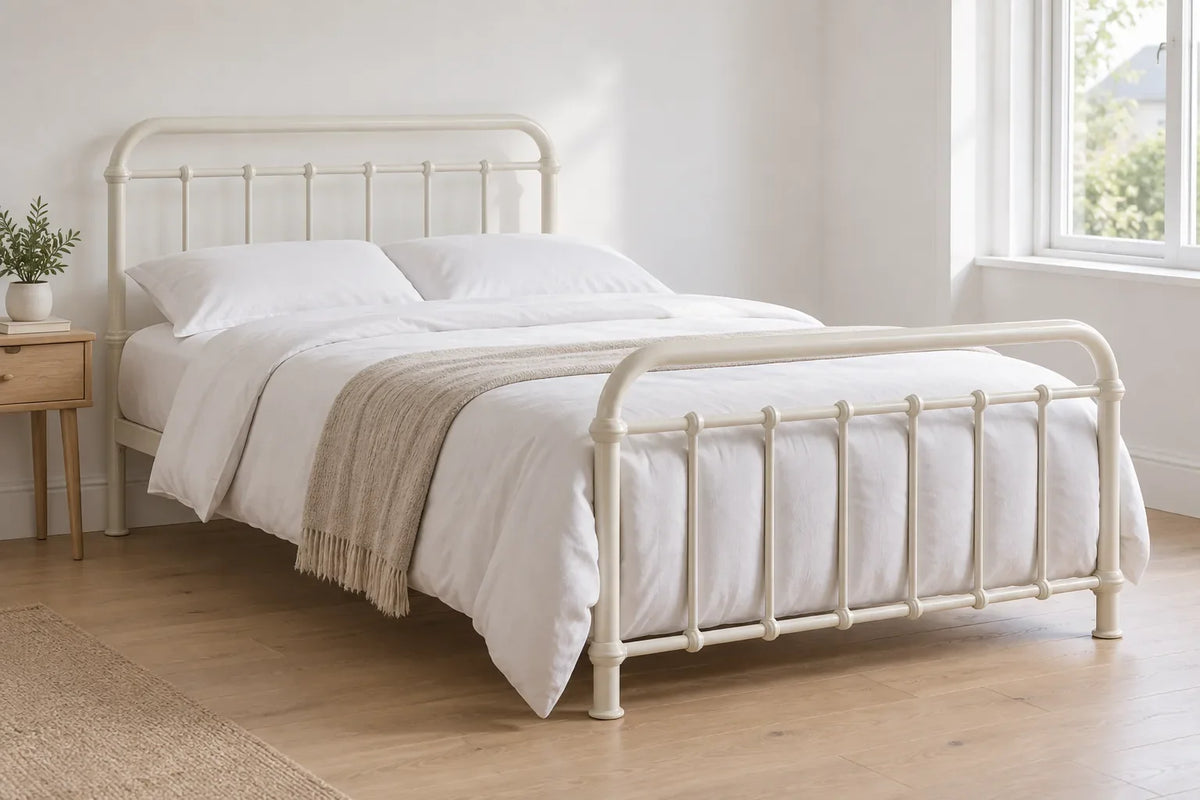 Miami king size metal bed frame in ivory with curved rails, in a bright UK bedroom