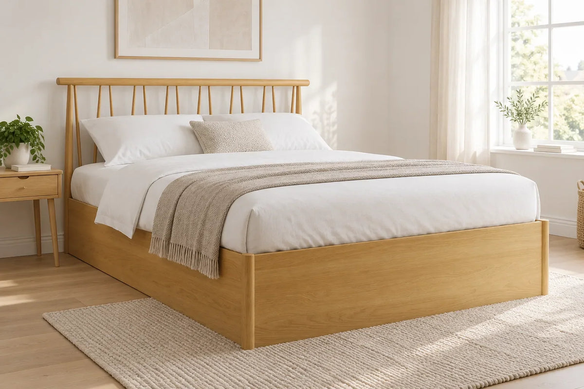 Richmond oak wooden ottoman bed with a spindle headboard, shown in a bright UK bedroom
