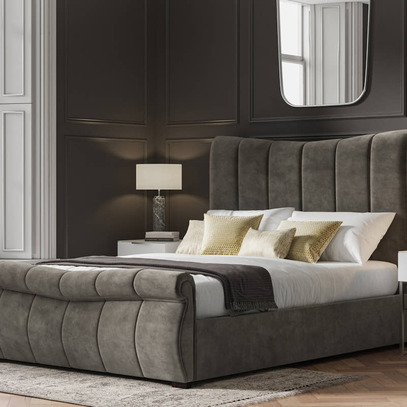 Southgate velvet ottoman bed in mid grey velvet, closed, in a bedroom