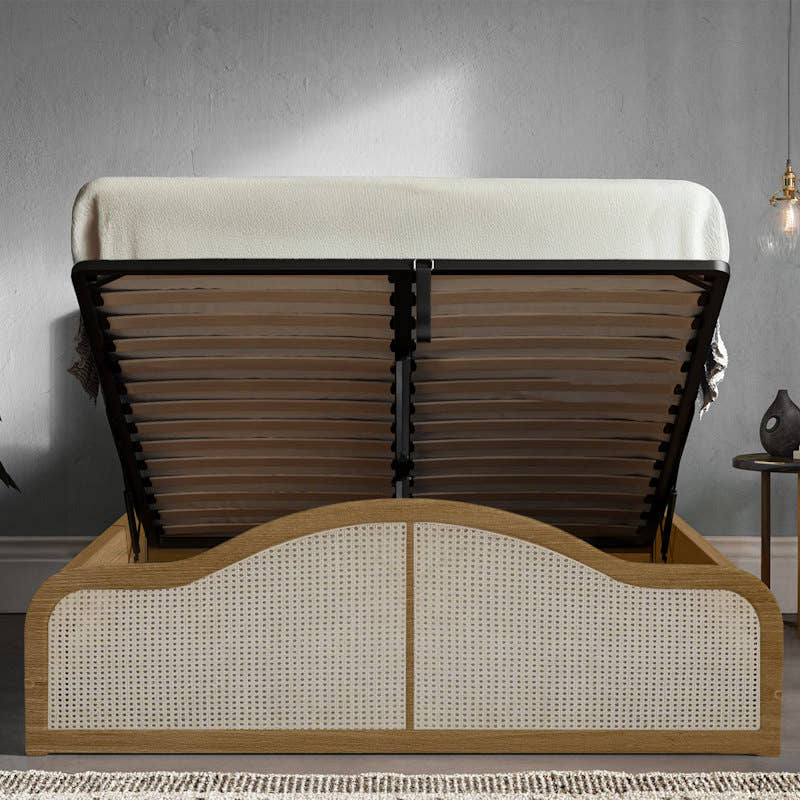 Edgware solid pine ottoman bed in oak finish, with the gas lift storage open