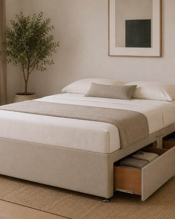 Platform top divan base with 4 drawers open, shown in a cream fabric, mattress for illustration only