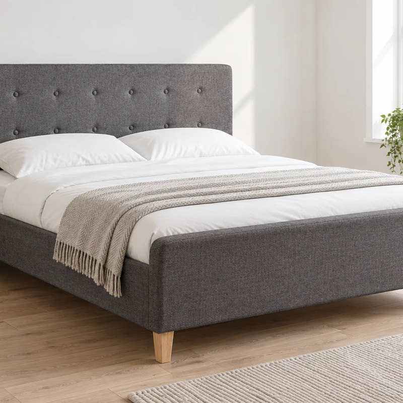 Bayswater dark grey ottoman bed, shown in a bright UK bedroom