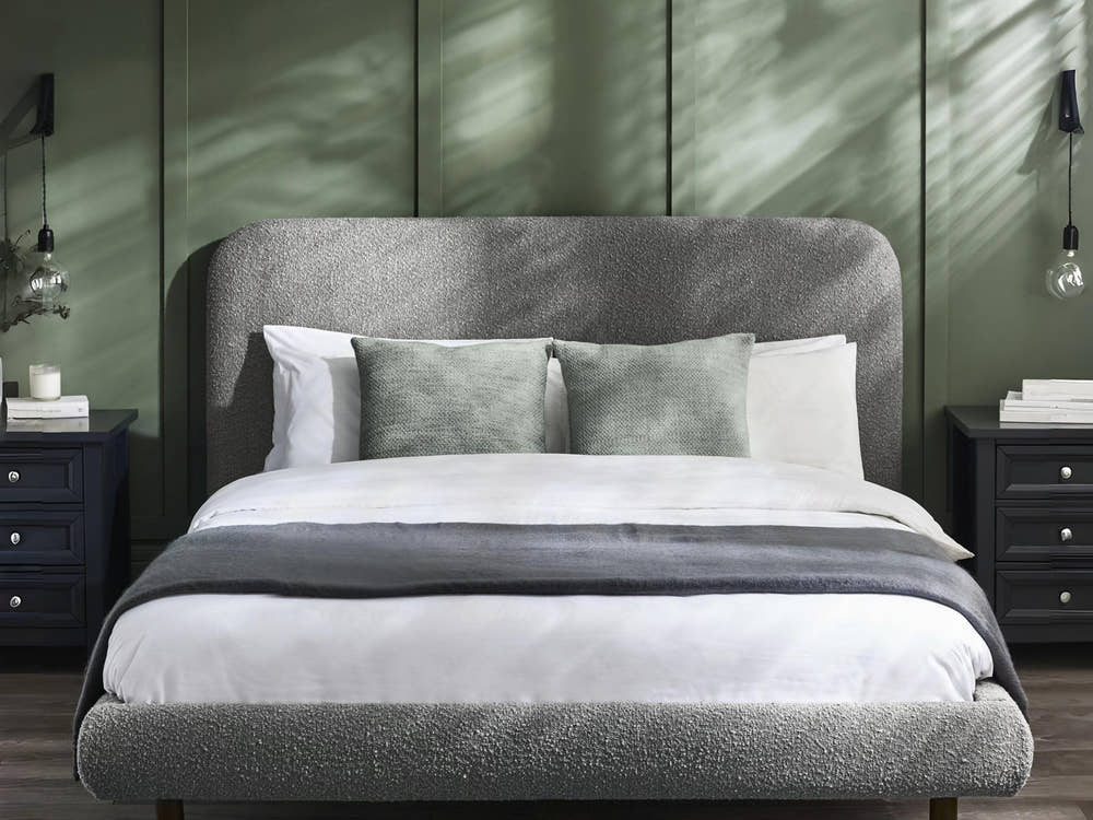 Julian Bowen Hannah grey boucle bed, in a bedroom with green panelled walls