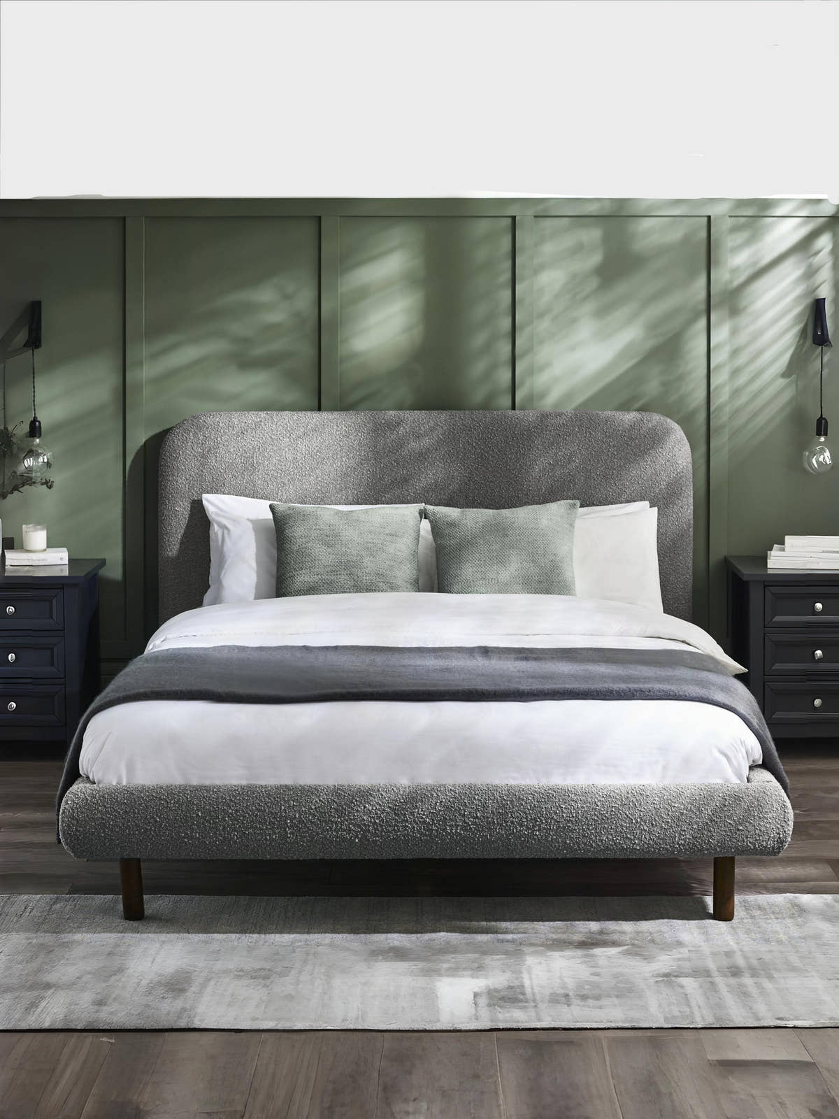 Julian Bowen Hannah grey boucle bed, in a bedroom with green panelled walls