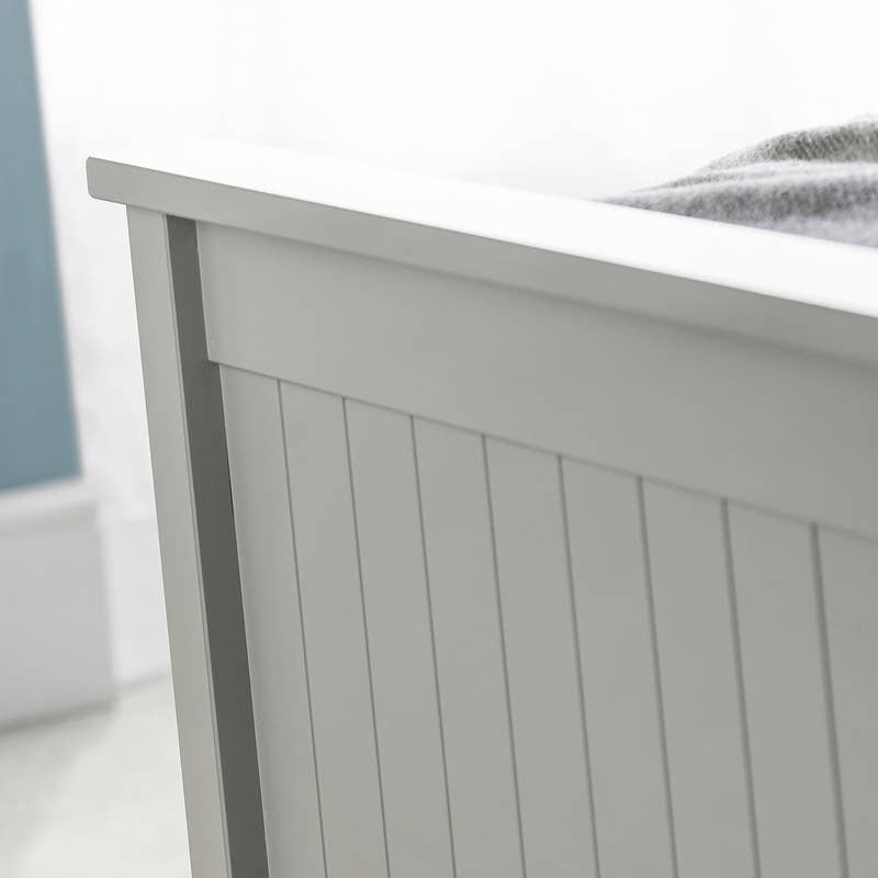 Maine ottoman bed: the dove grey footboard with vertical detailing, close up