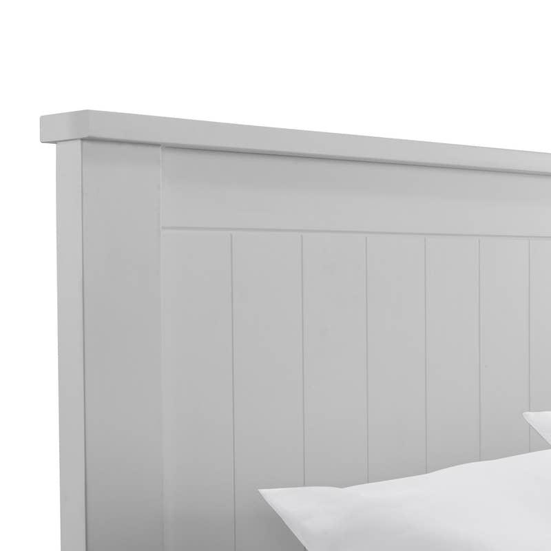Maine ottoman bed: the top of the dove grey panelled headboard, close up