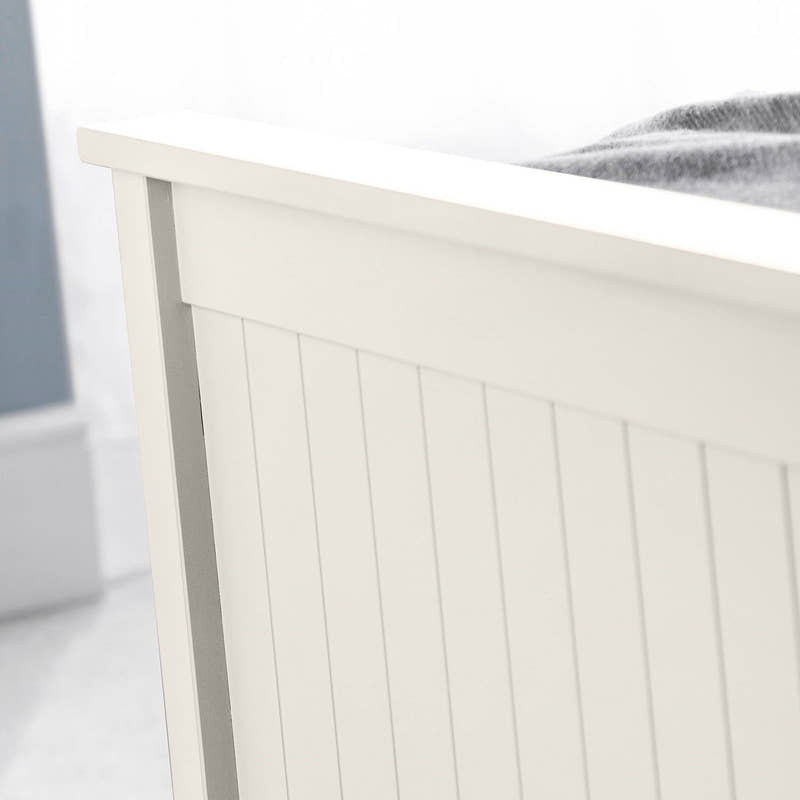 Maine ottoman bed: the surf white footboard with vertical detailing, close up