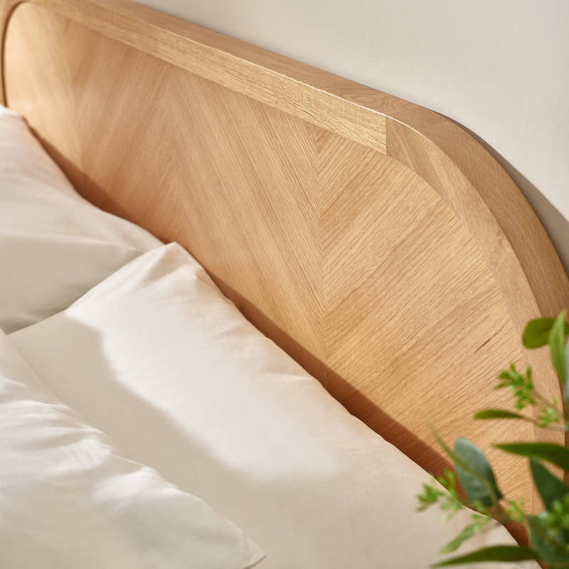 Milo bed: the chevron oak veneer headboard, close up