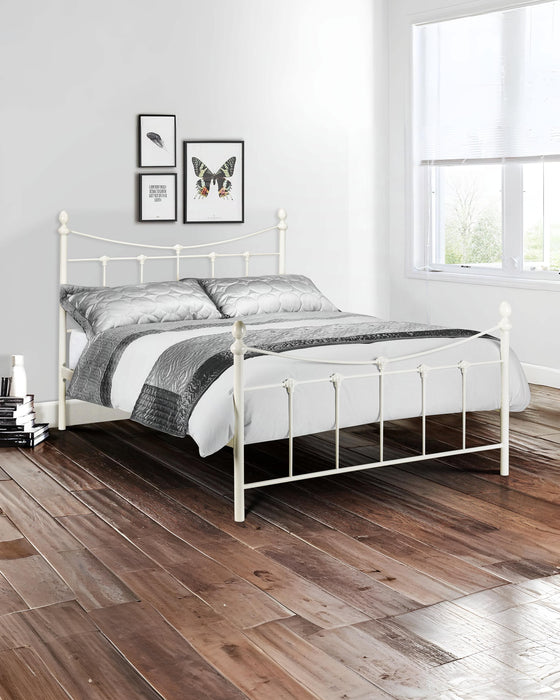 Julian Bowen Rebecca stone white metal bed, in a bright bedroom with a wooden floor