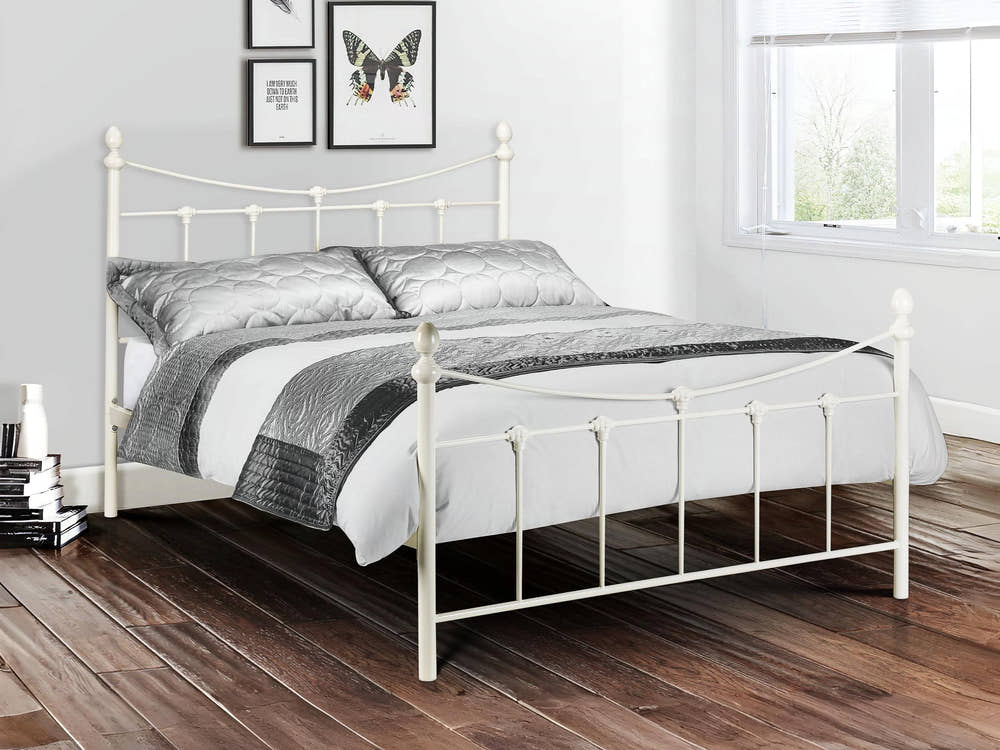 Julian Bowen Rebecca stone white metal bed, in a bright bedroom with a wooden floor