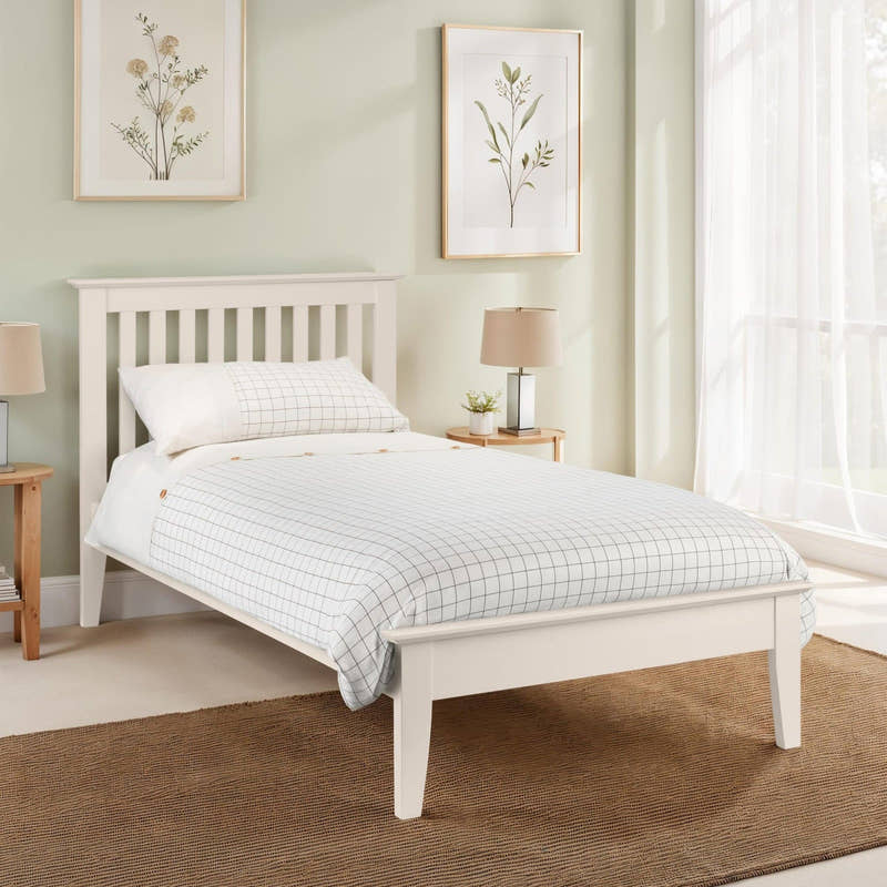 Julian Bowen Salerno ivory shaker bed in a bedroom with a pale green wall