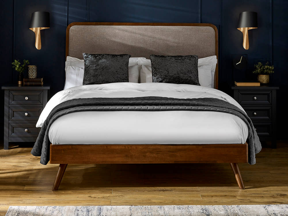 Julian Bowen Walden bed in walnut effect with a grey chenille headboard, in a bedroom