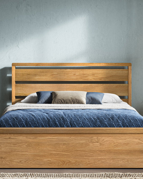 Hampton solid oak ottoman bed, natural finish, with the storage closed