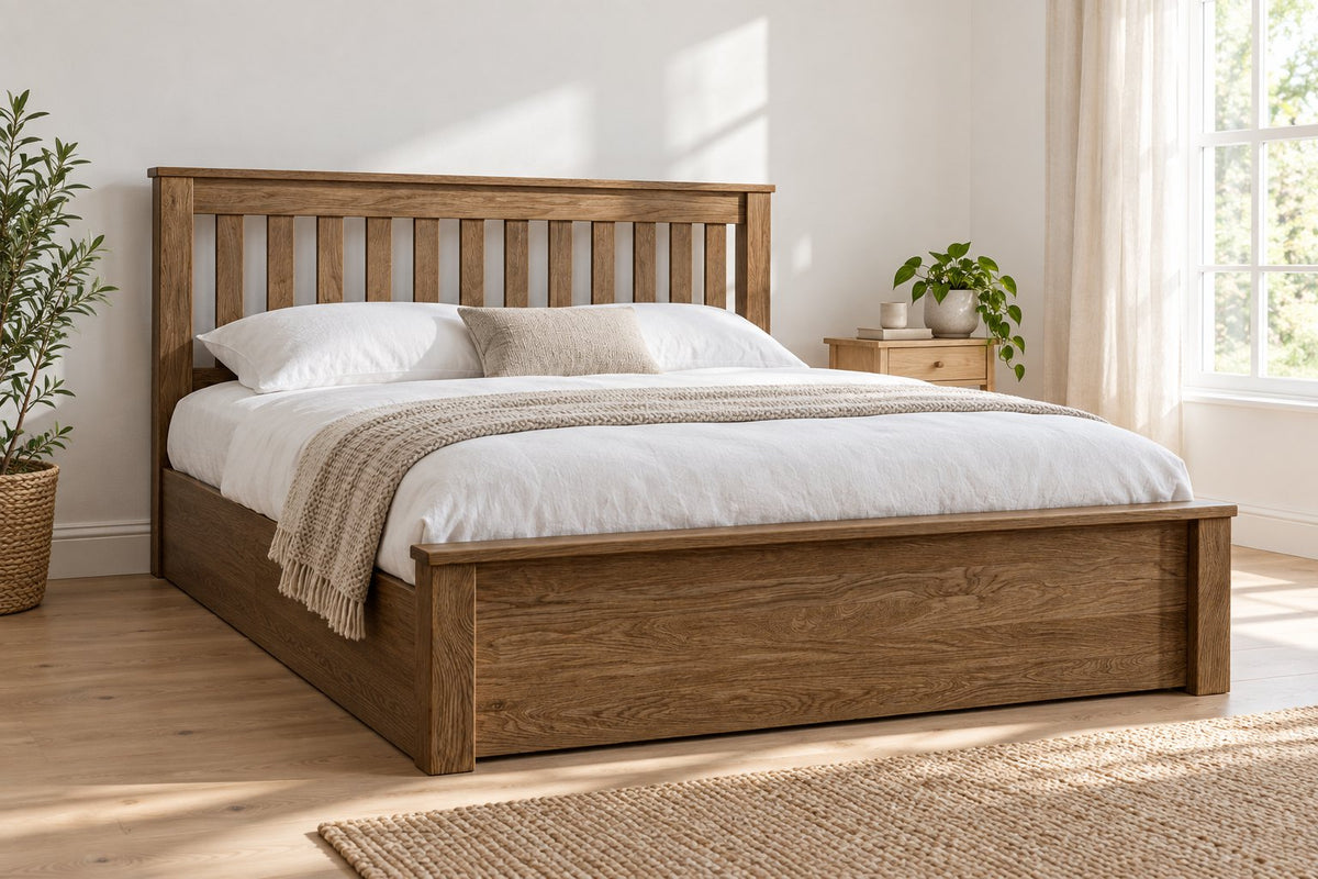 Kingston solid oak ottoman bed in a medium oak finish, king size, in a bright UK bedroom (bedding for illustration, mattress not included)