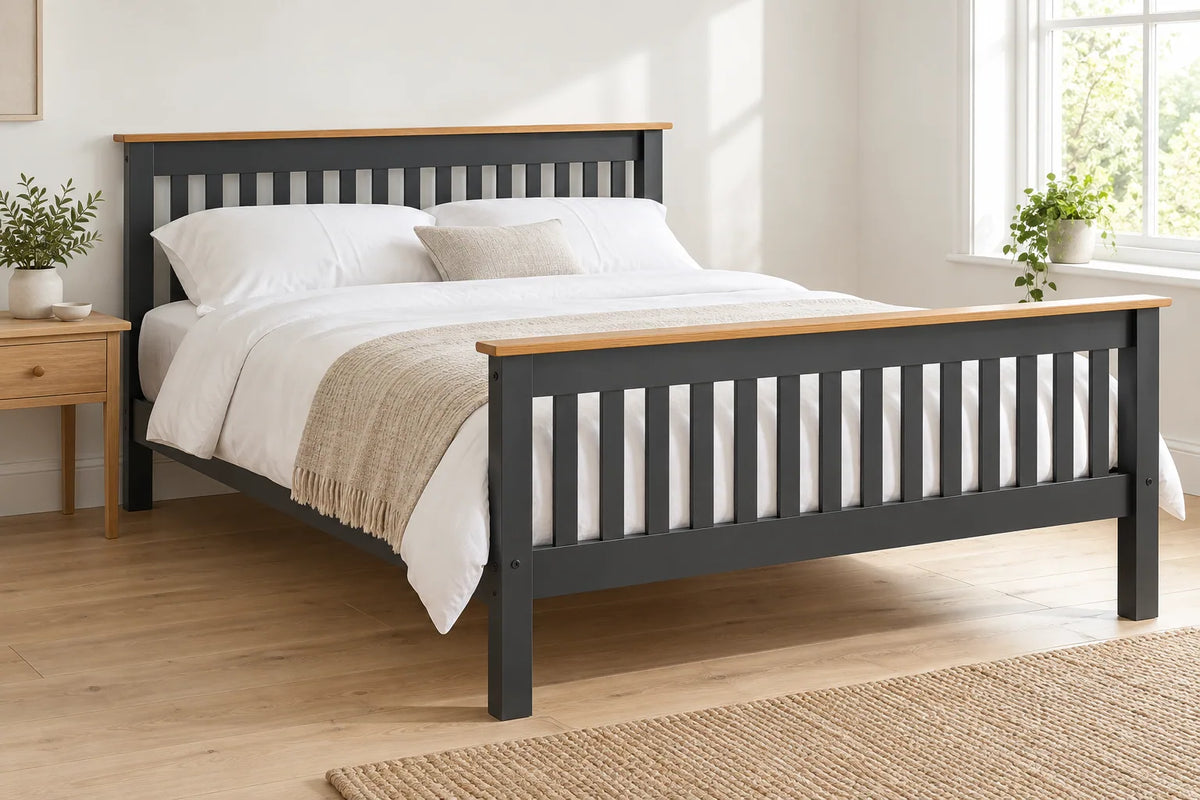 Balham grey and oak wooden bed frame with a high foot end, shown in a bright UK bedroom