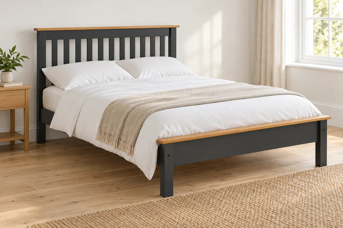 Balham grey and oak wooden bed frame with a low foot end, shown in a bright UK bedroom