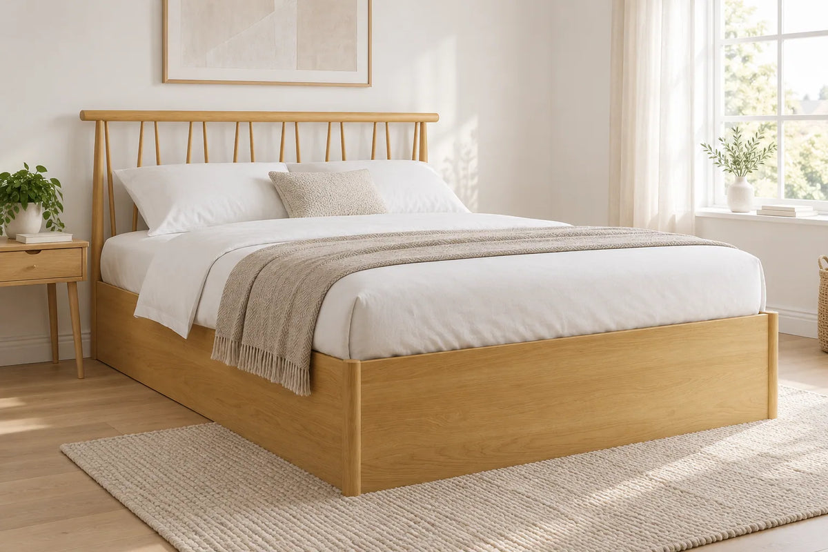 Richmond oak wooden ottoman bed with a spindle headboard, shown in a bright UK bedroom
