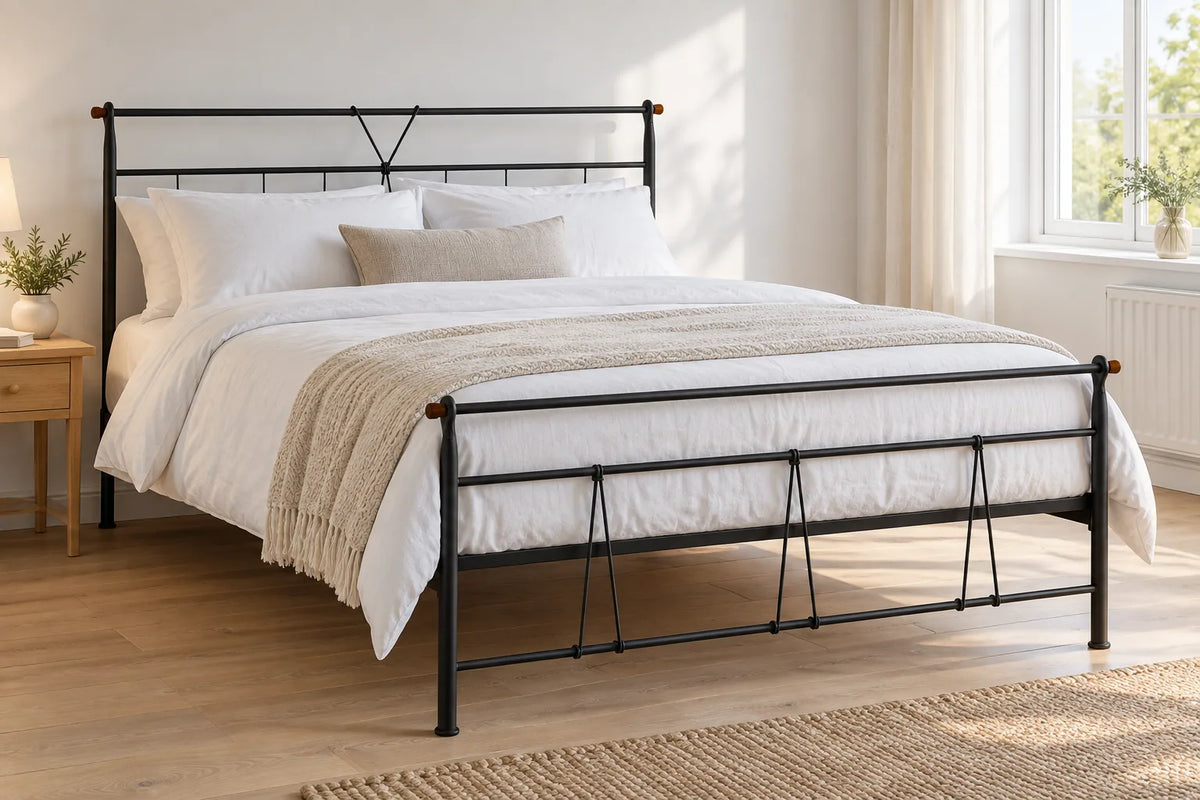 Vauxhall black steel bed frame, shown in a bright UK bedroom