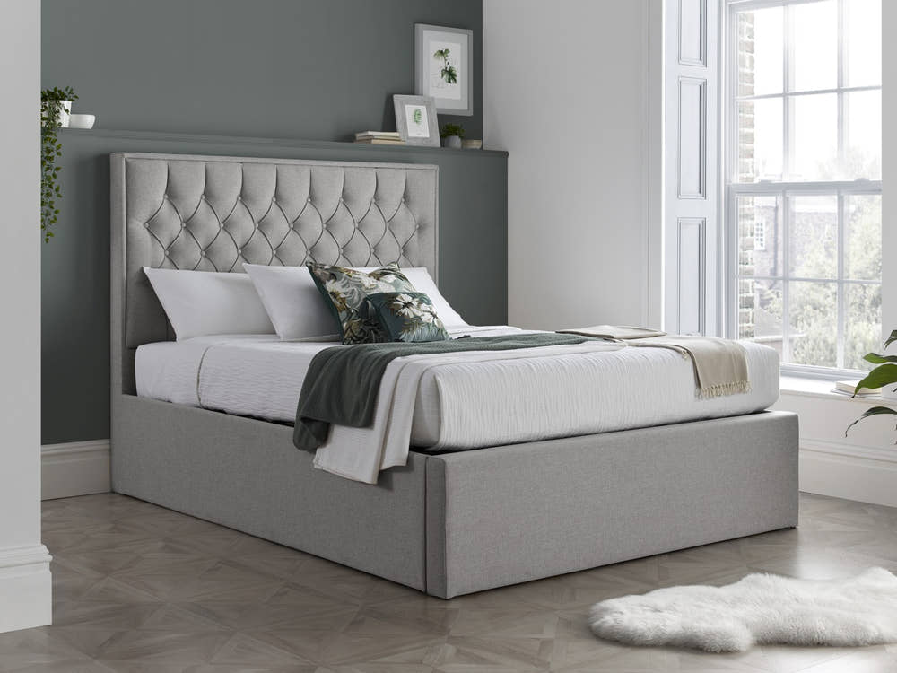 Wembley fabric ottoman bed in grey, closed, in a bedroom