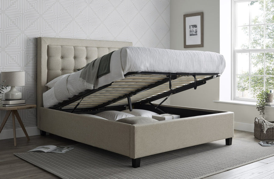 Tooting fabric ottoman bed in oatmeal, with the gas lift storage open