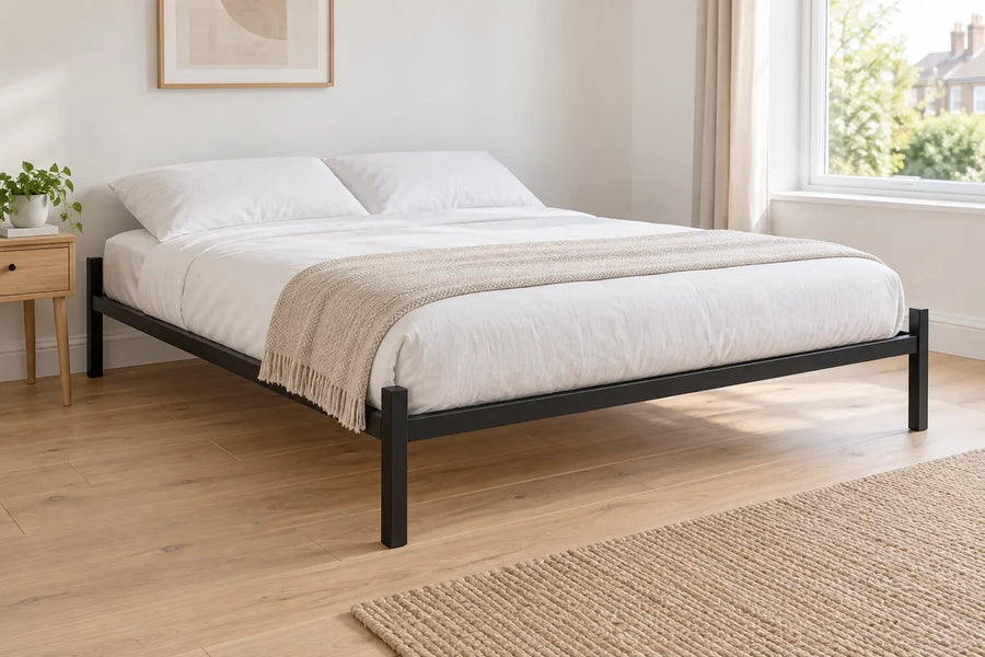 Callum super king heavy duty metal bed frame in black in a bright UK bedroom
