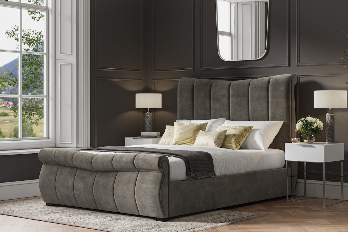 Southgate velvet ottoman bed in mid grey velvet, closed, in a bedroom
