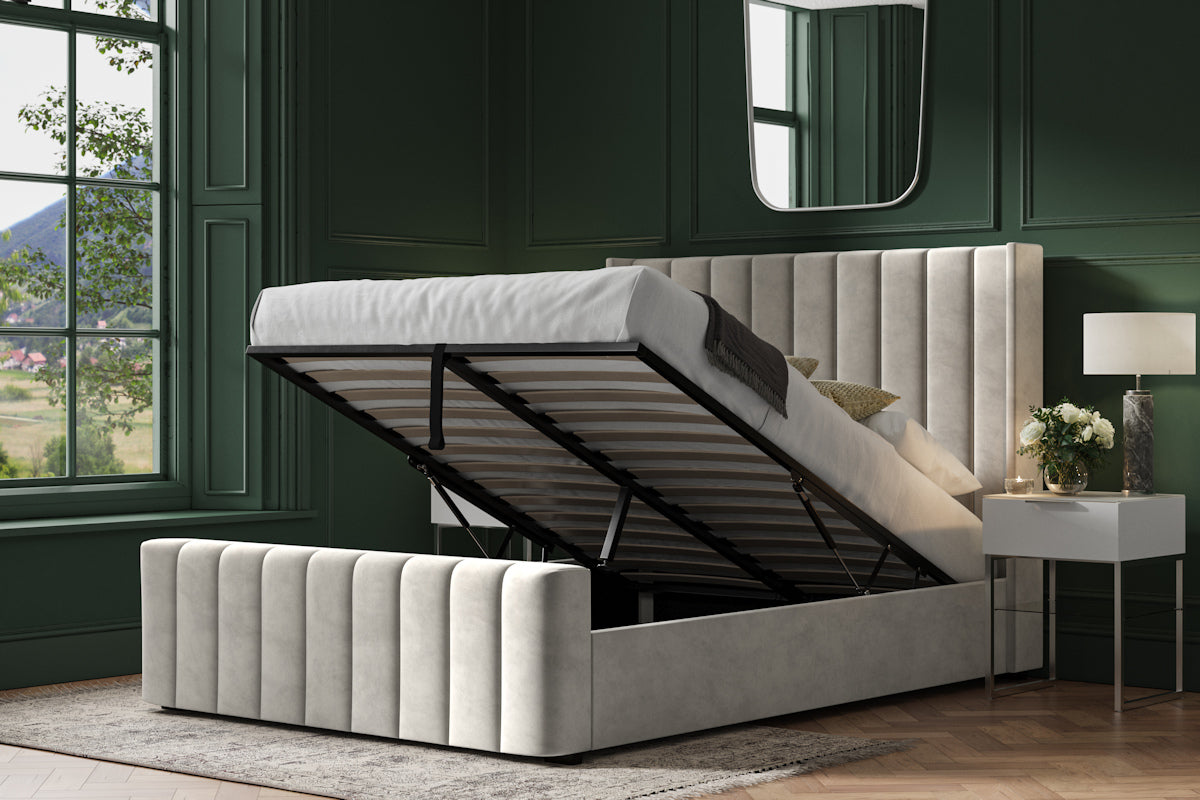 Stanmore velvet ottoman bed in light grey velvet, with the gas lift storage open