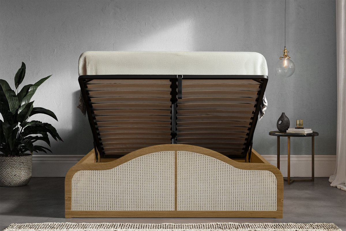 Edgware solid pine ottoman bed in oak finish, with the gas lift storage open