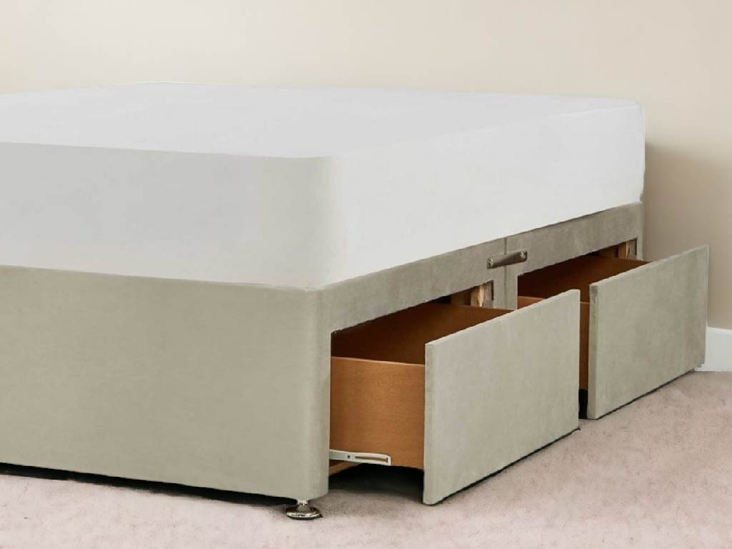 Close view of the divan drawers on runners and the chrome glider feet