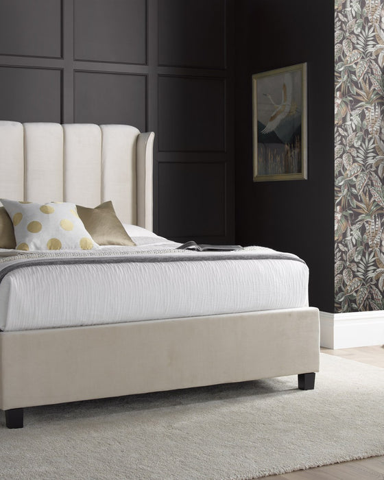 Holloway velvet ottoman bed in warmstone velvet, closed, in a bedroom
