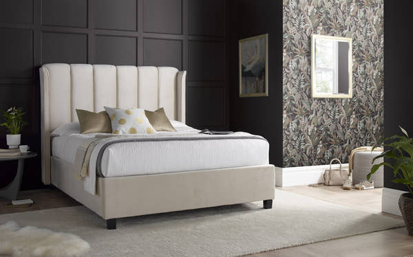 Holloway velvet ottoman bed in warmstone velvet, closed, in a bedroom