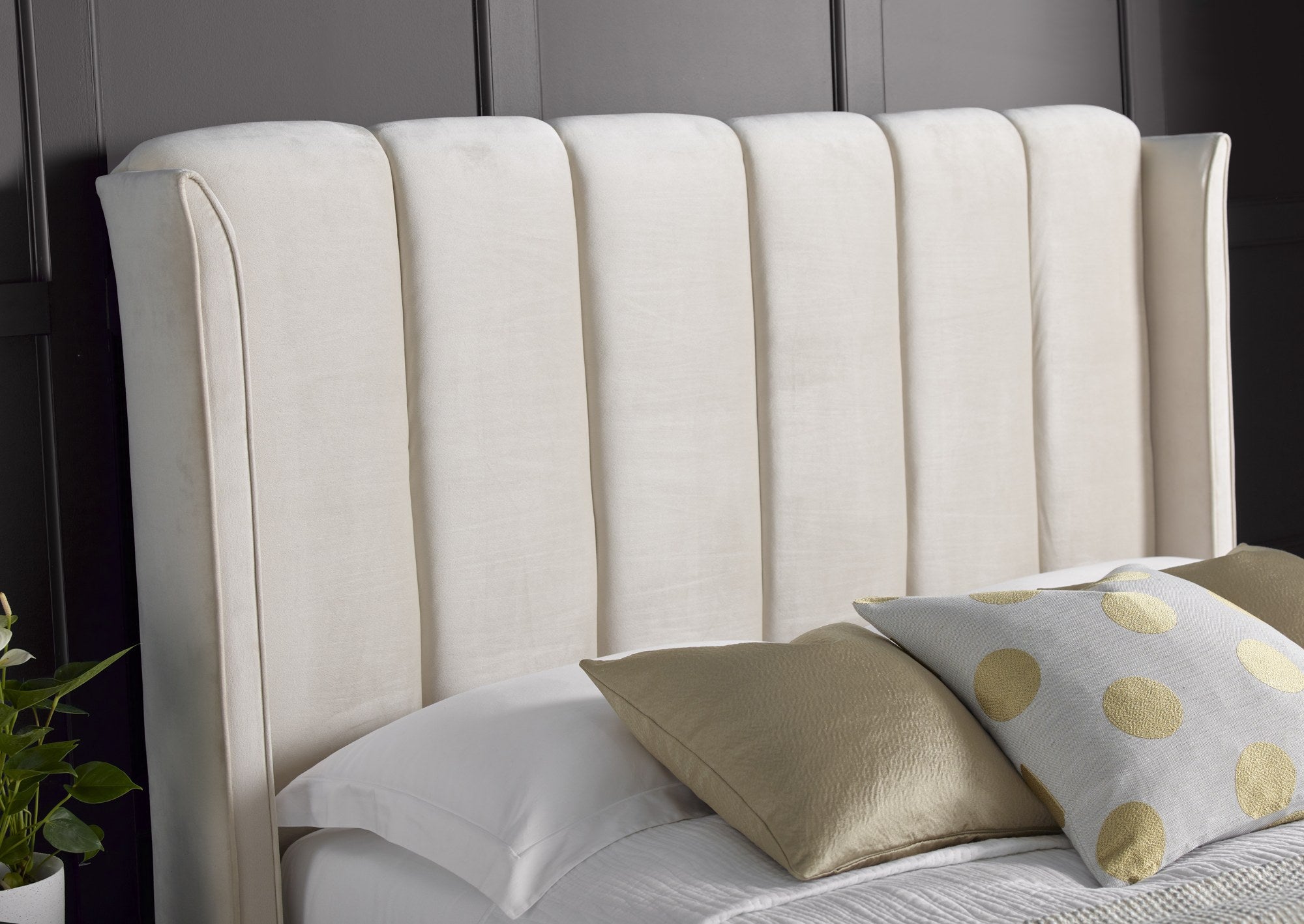 Holloway velvet ottoman bed in warmstone velvet, close-up of the art deco headboard