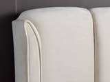 Holloway velvet ottoman bed in warmstone velvet, detail of the headboard wing