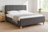 Bayswater dark grey ottoman bed, shown in a bright UK bedroom