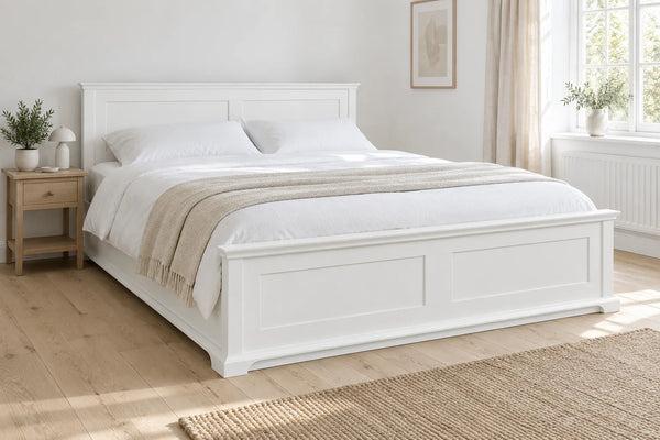 Belsize white wooden super king ottoman bed, shown in a bright UK bedroom