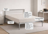 Bermondsey silver metal bed frame, in a bedroom with its height, length and under-bed clearance marked