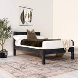 Mortlake wooden bed in solid oak, black finish