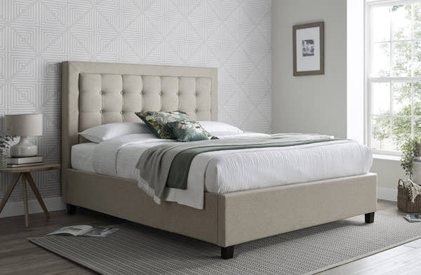Tooting fabric ottoman bed in oatmeal, closed, in a bedroom