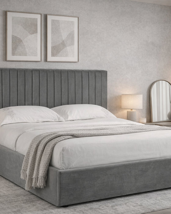 Dalston velvet ottoman bed, in smoked grey, in a bedroom