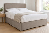 Slate linoso divan bed base with 2 drawers and a curved headboard, in a bright UK bedroom (bedding for illustration, mattress not included)