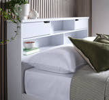 Harrow white wooden bed, close-up of the bookcase headboard