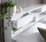 Harrow white wooden bed, one of the two headboard drawers open
