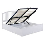 Barnet wooden ottoman bed in white, with the gas lift base raised