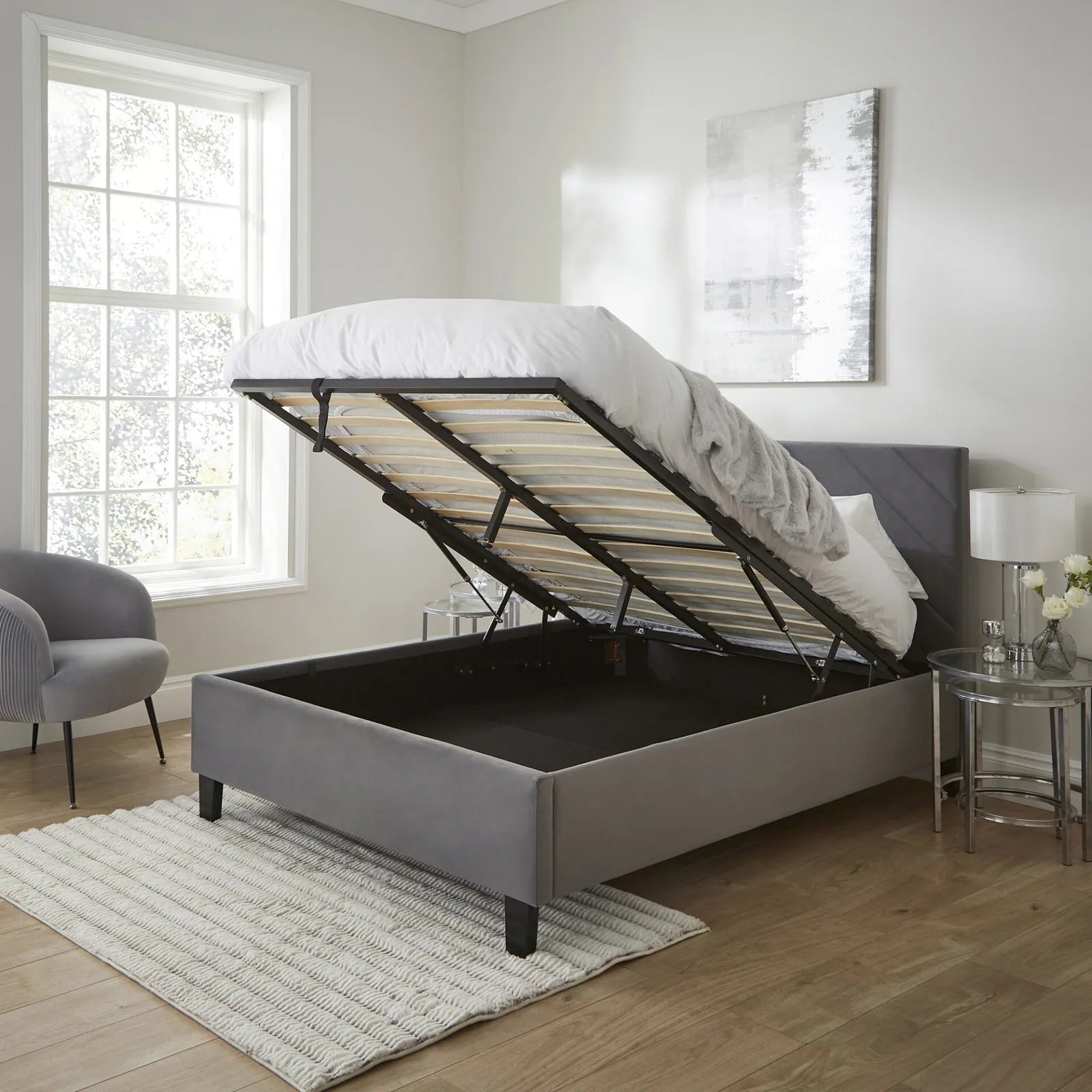 Hoxton ottoman bed frame in grey velvet with a chevron headboard, view 2