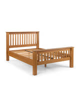 Julian Bowen Amsterdam high footend oak bed frame with its slats, on a white background