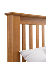 Amsterdam bed: oak post and slatted headboard, close up
