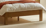 Julian Bowen Amsterdam light oak low footend and legs, close up