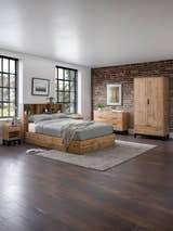 Julian Bowen Bali light oak effect ottoman bed in a loft bedroom, wide view