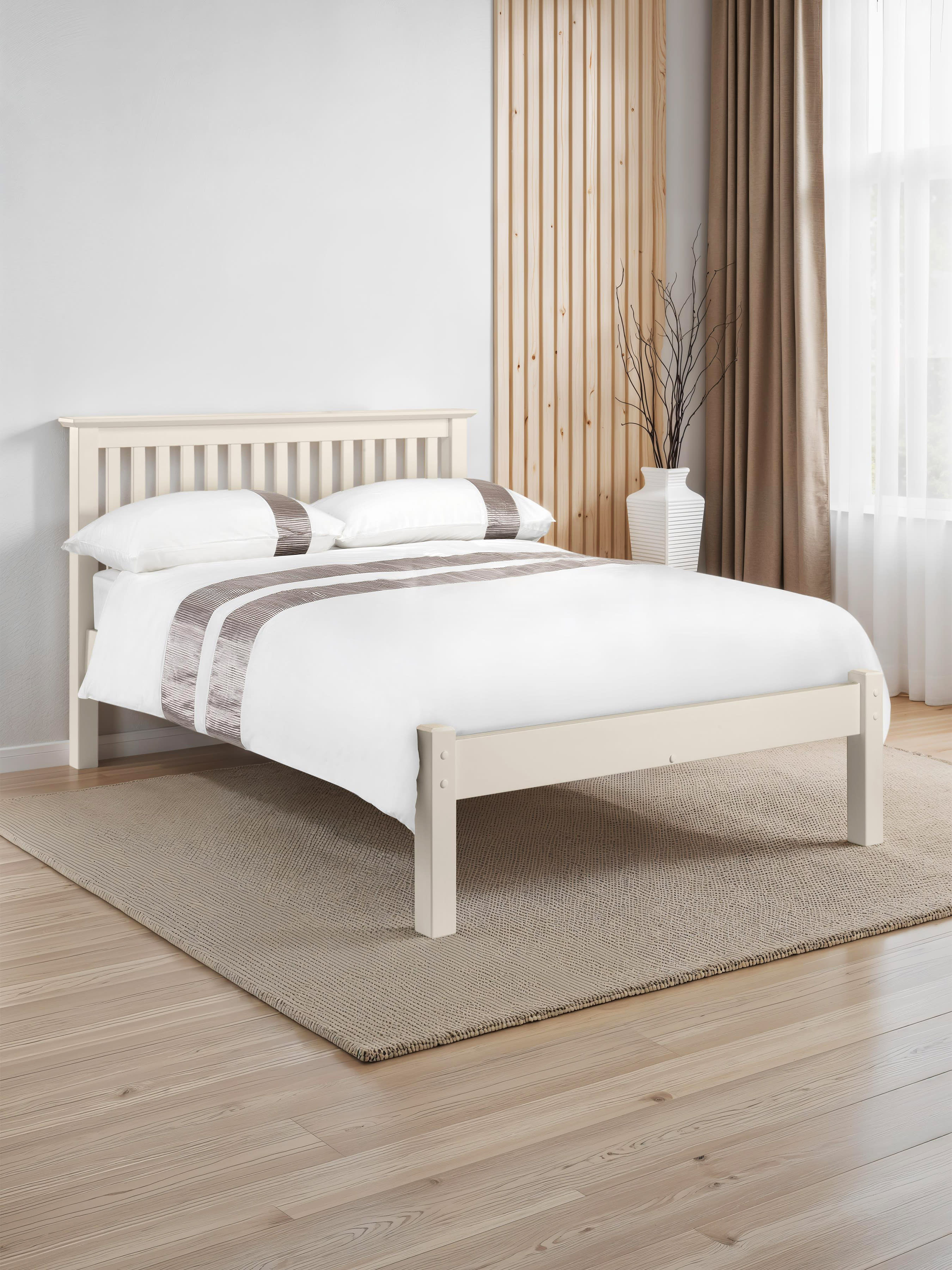 Julian Bowen Barcelona low footend bed in stone white, in a bright bedroom